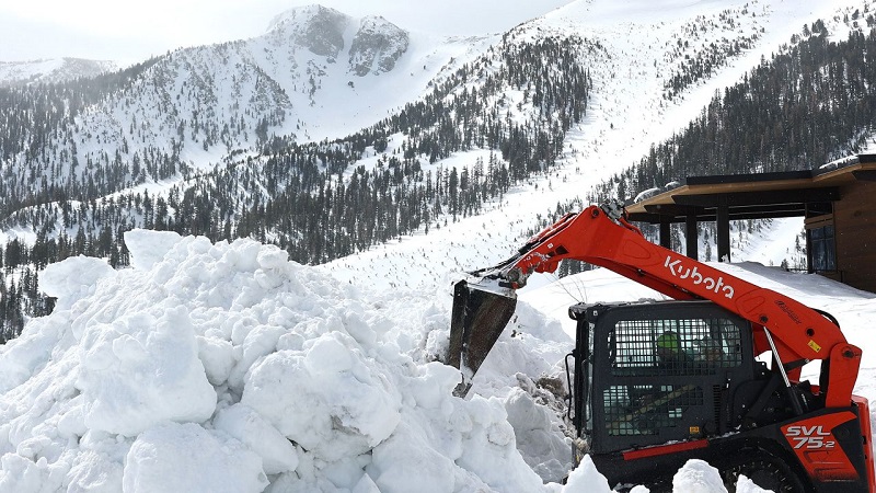 California faces a second day of heavy rain and snow, adding to record snow levels concerns.